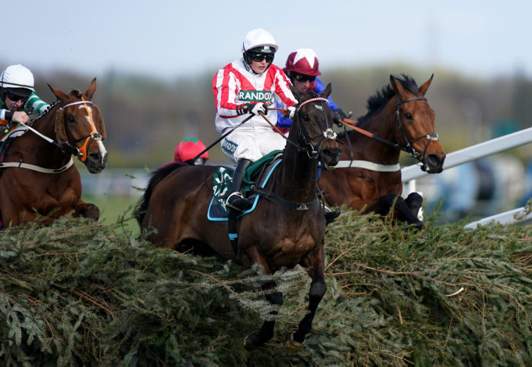 Latenightpass in action at Aintree